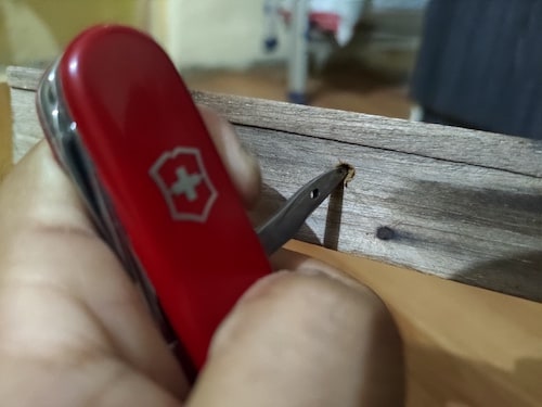 Drilling holes in wood with the SAK Awl